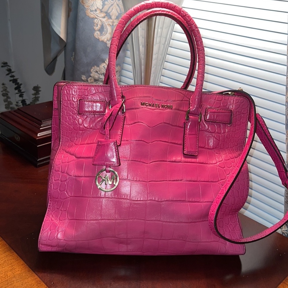 Michael Kors. Bright pinkish … fushia-ish bag. Large